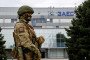 A Russian serviceman stands guard outside the Zaporizhzhia Nuclear Power Plant in occupied Enerhodar. (Photo: open source)