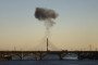 Smoke rises over a bridge spanning the Dnipro River following a drone attack in Kyiv on October 2, 2026. (Source: Getty Images)