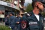 Armenian police officers secure the cordoned-off area following an armed bank robbery attempt in an HSBC bank branch in Yerevan on May 3, 2018. (Source: Getty Images)