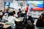 Pupils of a secondary school listen to a teacher addressing at the first day of the new school year in Moscow on September 1, 2026. (Source: Getty Images)