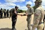 A Russian Africa Corps instructor shakes hands with a Malagasy serviceman during military training in Madagascar. (Photo: Open source)