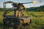 A front three-quarters view shows the Tanchik Droid 12.7 unmanned ground vehicle equipped with a heavy machine gun. (Source: Ministry of Defense of Ukraine)