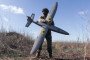 Ukrainian soldier from the “Taifun” UAV unit holds a ‘Marsianin’ attack drone in Kharkiv region, Ukraine, April 7, 2026. (Source: Getty Images)