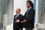 Russian leader Vladimir Putin poses with Russian pop singer Philip Kirkorov during a state awards ceremony at the Kremlin in Moscow on November 15, 2017. Illustrative photo. (Source: Getty Images)