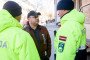 Latvian policemen talk with a man supporting Russia on the sidelines of a demonstration in solidarity with Ukraine on April 3, 2022 in Daugavpils. Illustrative image. (Photo: Gints Ivuskans/AFP via Getty Images)