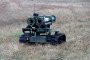 A weapon is mounted on the Lehit ground robotic system, developed by specialists of the International Legion under the Defence Intelligence of Ukraine, during a demonstration in Ukraine on December 9, 2025. Illustrative photo. (Source: Getty Images)