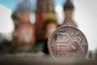 A Russian ruble coin pictured against St. Basil's Cathedral amid economic slowdown, September 2025. (Source: Getty Images)
