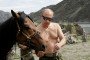 Then-Prime Minister of Russia Vladimir Putin pictured with a horse during a vacation outside the town of Kyzyl in southern Siberia. (Source: Getty Images)