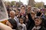 A large crowd of Armenians, including children, raises portraits and fists in unison at a rally in Yerevan, Armenia, on March 29, 2025. Illustrative photo.