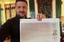 President Volodymyr Zelenskyy displays documents on Russia’s political outlook ahead of the September 2026 elections. (Source: Zelenskyy/Telegram)