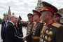 Russian leader Vladimir Putin meets North Korean servicemen following the Victory Day military parade on Red Square in Moscow, May 9, 2025. (Source: Getty Images)
