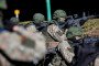 Members of the Lithuanian Armed Forces during Saber Strike military training on March 1, 2022, in Kazlu Ruda, Lithuania.