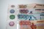 Mixed Russian ruble banknotes of various denominations, including 100, 500, 1,000, and 5,000 rubles. (Source: Getty Images)