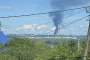 Smoke rises from a Russian oil refinery in Ufa, June 25, 2026.