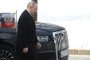 Russian leader Vladimir Putin walks beside his Aurus limousine during a wreath-laying ceremony at the Tomb of the Unknown Soldier in Moscow on February 23, 2025. (Source: Getty Images)