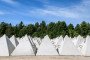 Dragon’s teeth fortifications, pyramidal anti-tank obstacles, are seen during a press tour to present military reinforcement measures near the border of Latvia with Russia. (Source: Getty Images)