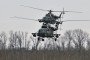 Ukrainian Mi-8 military helicopters fly at low altitude in the Kharkiv region on April 2, 2023. (Source: Getty Images)