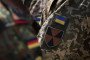 A Ukrainian soldier stands next to a Bundeswehr soldier during NBC countermeasures training at a site training area, Bavaria, Sonthofen, June 29, 2023. (Source: Getty Images)