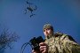 A Ukrainian serviceman sharpens his drone-flying skills during a training session.