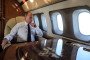 Russian leader Vladimir Putin looks out of a presidential aircraft window. (Source: Getty Images)