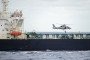 A helicopter approaches the "Deyna" tanker during a French Navy operation in the Mediterranean. (Source: French President Emmanuel Macron/X)