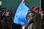 Servicemen hold European Union flag during commencement ceremony of the EU Battle Group’s duty in 6th Logistics Battalion in Krakow. (Source: Getty Images)