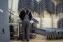 An employee assembles a long-range drone in a workshop of the Fire Point company which manufactures FP-1 deep-strike drones and FP-2 strike drones in an undisclosed location in Ukraine. (Source: Getty Images)