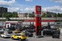 People queue to refuel their cars at a Lukoil petrol station in Moscow. (Source: Getty Images)