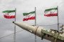 Missiles produced by Iran’s armed forces are displayed near a row of Iranian flags on February 11, 2026, in Tehran, Iran. (Source: Getty Images)
