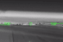 A thermal drone camera view shows a strike on a Russian military target. (Source: screenshot from a video by the Unmanned Systems Forces, "Birds of Madyar")
