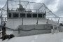 Anti-drone netting covers the bridge of a Russian FSB Project 22460 “Okhotnik” patrol ship. (Source: Russian milblogger channel)