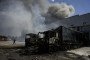 A man walks past burned-out trucks near a warehouse damaged in a Russian air attack on Kyiv on September 2, 2026. Illustrative photo. (Source: Getty Images)