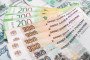 Ruble notes of different denominations are placed on a table. (Source: Getty Images)