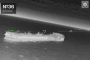A thermal camera feed from a Ukrainian drone tracks a Russian shadow fleet oil tanker on the water approaches to Crimea. (Source: Unmanned Systems Forces of Ukraine)