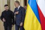 President of Ukraine, Volodymyr Zelenskyy, speaks with Polish Prime Minister, Donald Tusk, on December 19, 2025, in Warsaw, Poland. (Source: Getty Images)