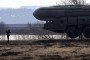 Russian soldier guards a model of Topol intercontinental ballistic missile during a training session at the Serpukhov military missile forces research institute outside Moscow on April 6, 2010.
