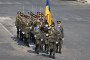Ukrainian troops parade with the Coalition of volunteers of invited foreign nations during the annual Bastille Day military parade on the Champs-Élysées Avenue in Paris on July 14, 2026. (Source: Getty Images)