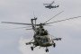 A Russian Air Force Mil Mi-8 and Kamov Ka-52 "Alligator" attack helicopter fly during the annual Army Games defense technology international exhibition in Russia. Illustrative photo. (Source: Getty Images)