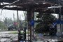 Illustrative photo of a Russian military truck near a destroyed fuel station in Mariupol, Ukraine, May 18, 2022. (Source: Getty Images)
