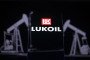 The Lukoil logo appears on a smartphone screen in this photo illustration. (Source: Getty Images)
