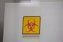 A biohazard sticker is displayed at the Invitro LLC laboratory in Moscow, Russia, on Wednesday, April 15, 2020. Illustrative image. (Source: Getty Images)