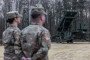US soldiers stand next to Patriot surface-to-air missile launchers of the 37th Air Defense Missile Squadron from the 3rd Warsaw Air Defense Missile Brigade in Sochaczew, on December 18, 2024.