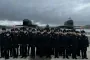 Students from Murmansk visited the submarine base in Gadzhievo, where what appears to be anti-drone nets can be seen covering the vessels. (Photo: Russian media)