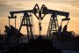 Oil pumping jacks, also known as “nodding donkeys”, operate in an oilfield near Almetyevsk, Tatarstan, Russia, on March 11, 2020.