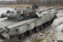 Russian tank crossing a river somewhere in Ukraine, 2022.