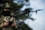 Ukrainian military of the 214th Separate Assault Battalion OPFOR control the Mavic 3 Pro drone during training on April 18, 2025. (Source: Getty Images)