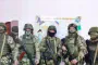 Russian soldiers pose for a photo during the Russian invasion of Ukraine.