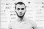 A black-and-white photo of Ukrainian athlete and coach Dmytro Rusetzkyi. (Source: Olha Pavlenko/Instagram)