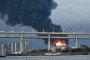 Smoke rises over St. Petersburg following a drone strike on an oil terminal on October 18, 2026. (Source: Getty Images)