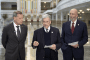 US Special Envoy John Coale (center) speaks to reporters in Minsk after negotiating an interim agreement with Belarus. (Source: Belarusian state media)